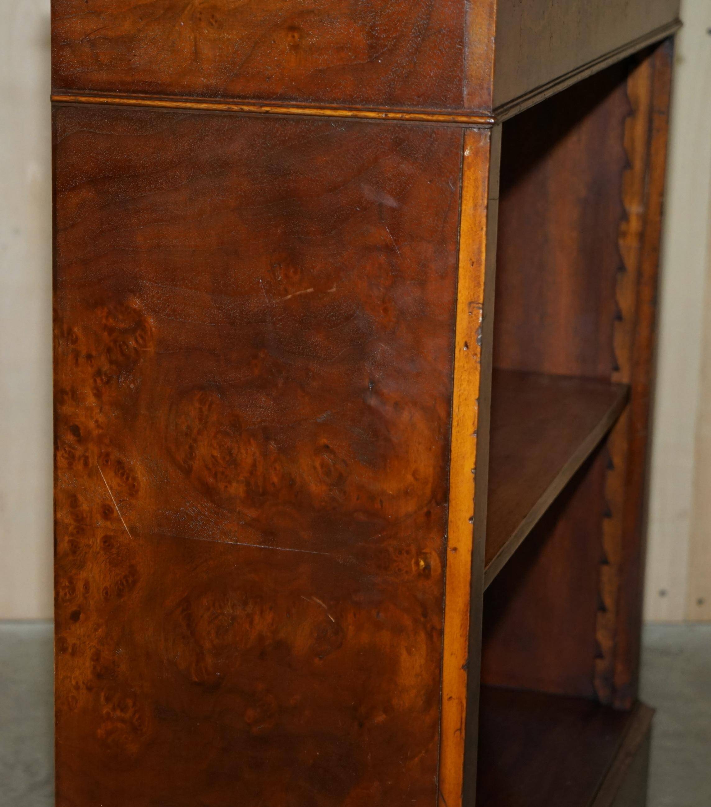 Brights of Nettlebed style Sheraton dwarf library in burr elm, walnut, and mahogany.