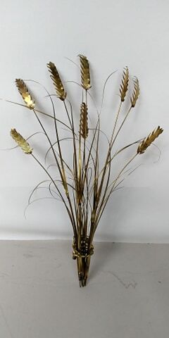 Daniel d'Haeseleer's brass mural sculpture