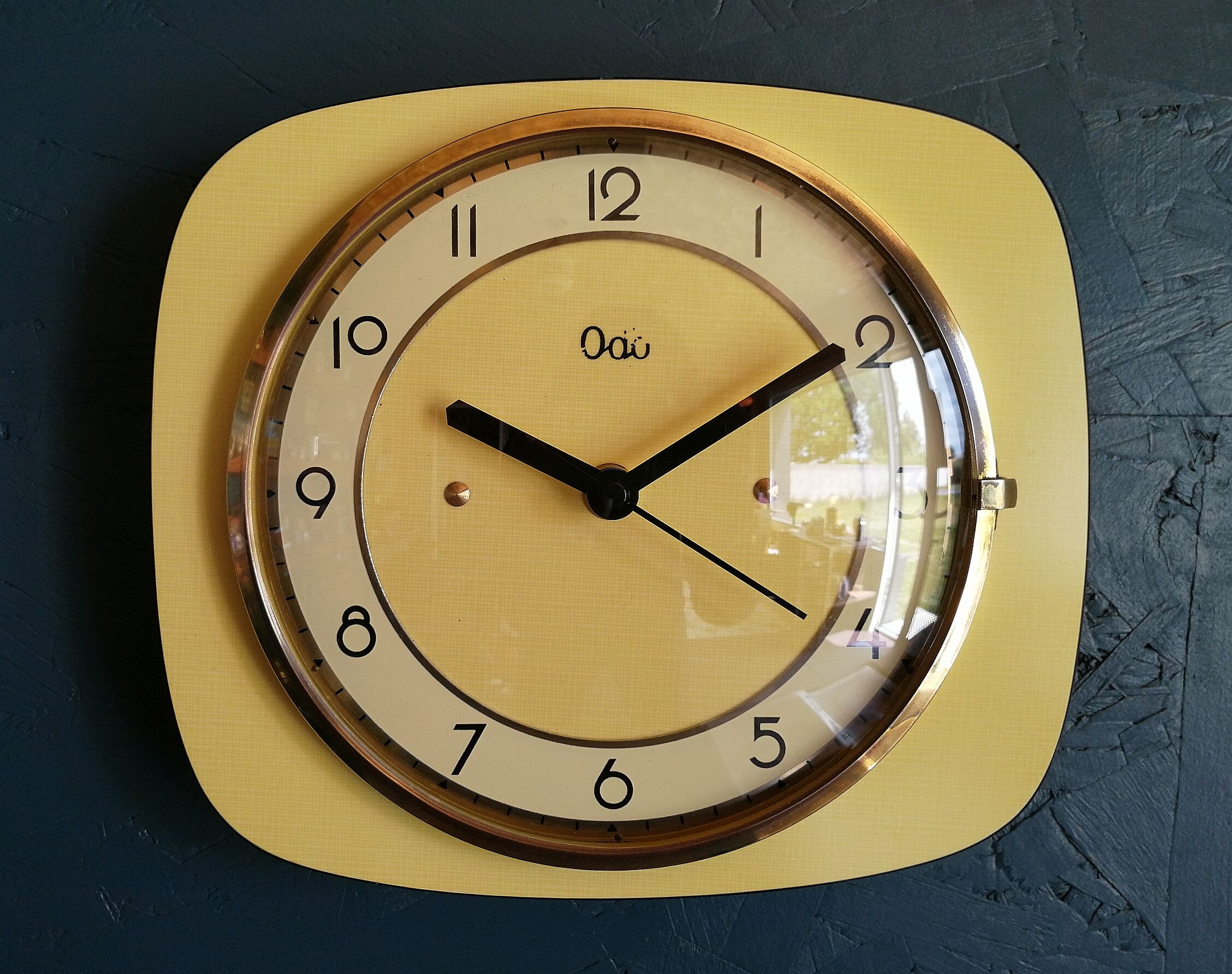 Clock formica vintage silent wall pendulum "Yellow Odo"