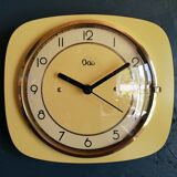 Clock formica vintage silent wall pendulum "Yellow Odo"