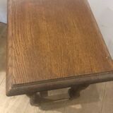 Small children's table (or coffee table) in brown varnished oak.