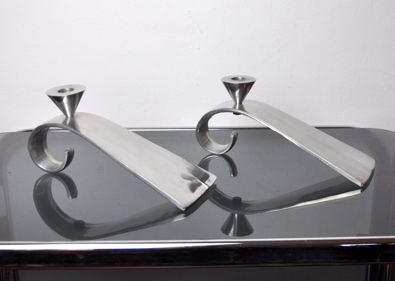 Pair of comma candlesticks by matthew hilton, England, 1980