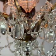 Bronze cage chandelier adorned with crystal drops, circa 1880