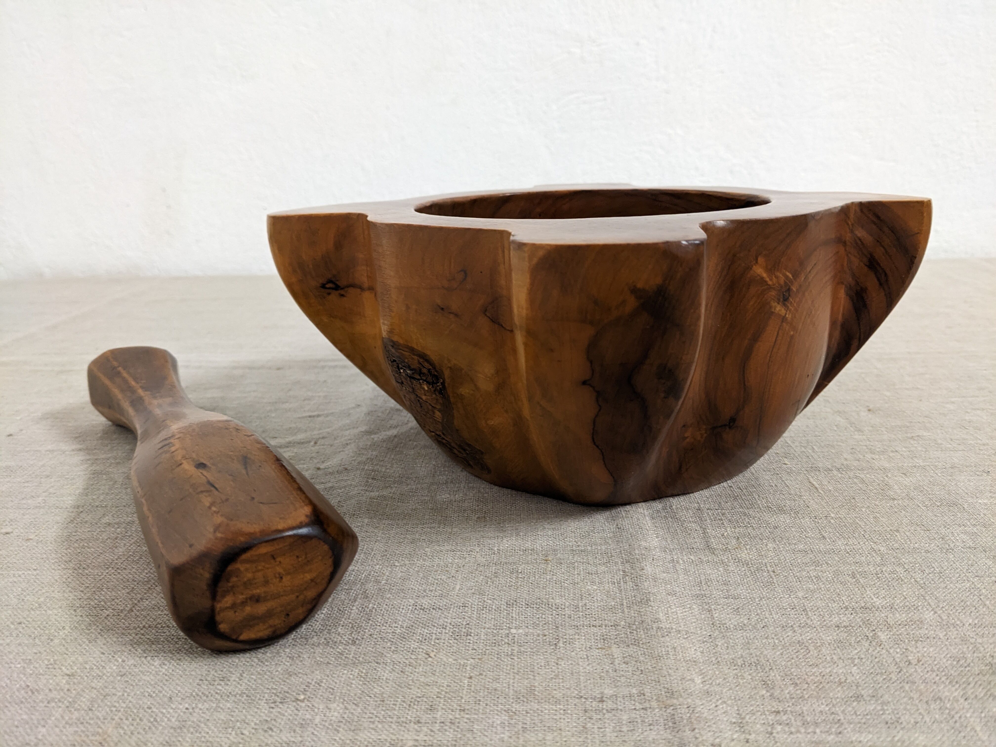 Mortar and its vintage olive wood pestle