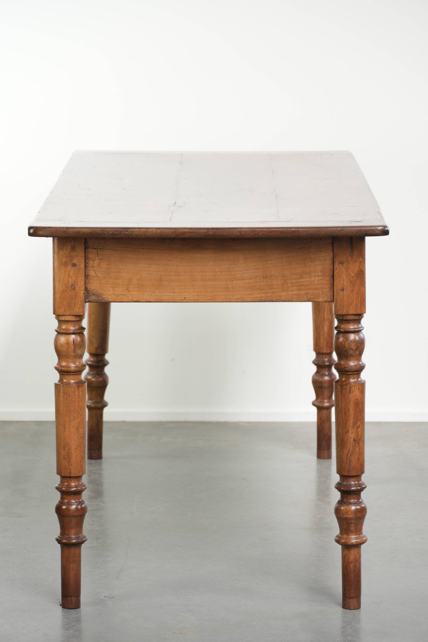 Antique French cherry wood dining table from the 19th century