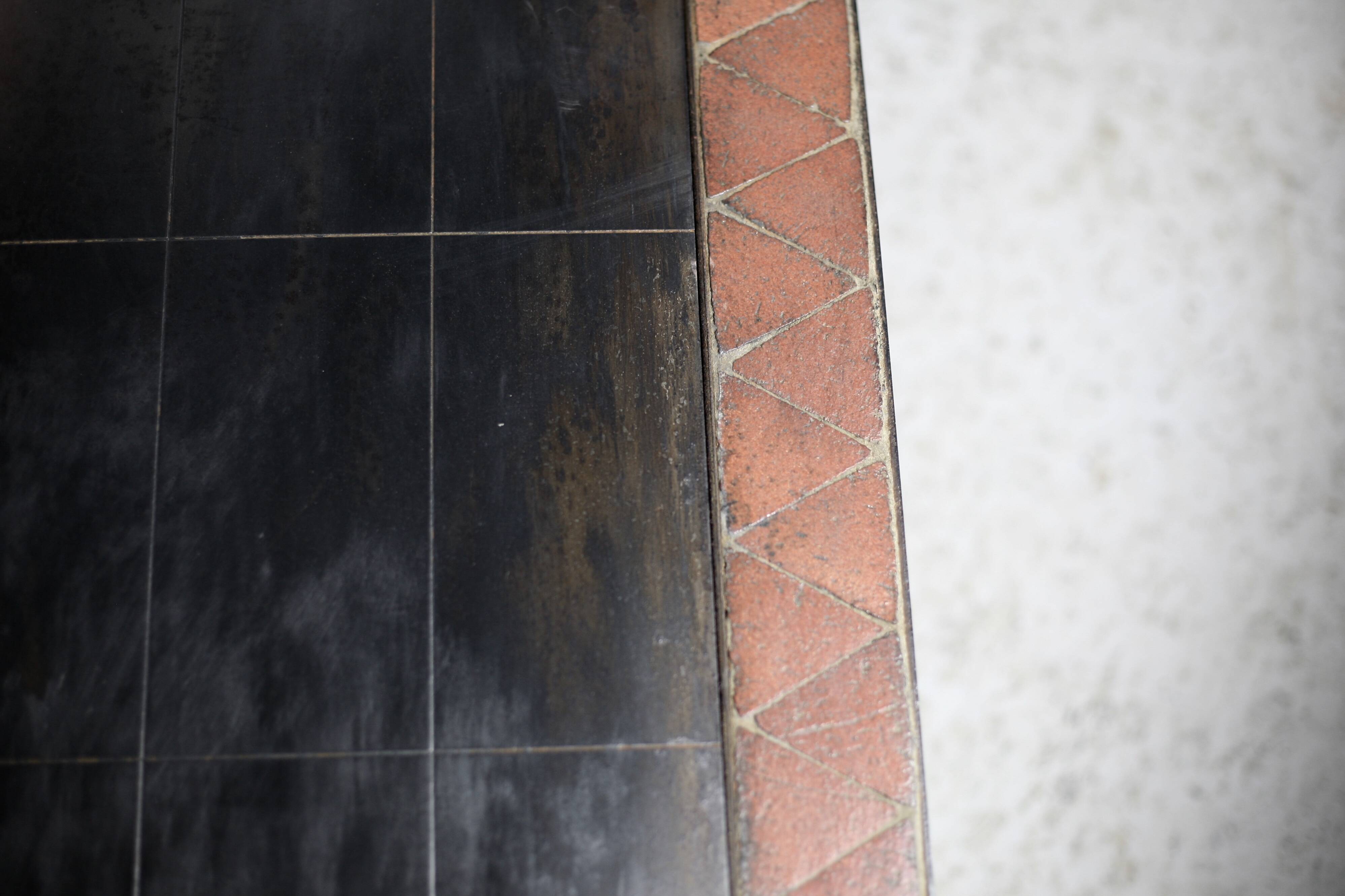 Coffee table, ceramic and steel plates, circa 1960.