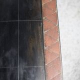 Coffee table, ceramic and steel plates, circa 1960.