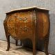 Louis XV style curved chest of drawers in marquetry