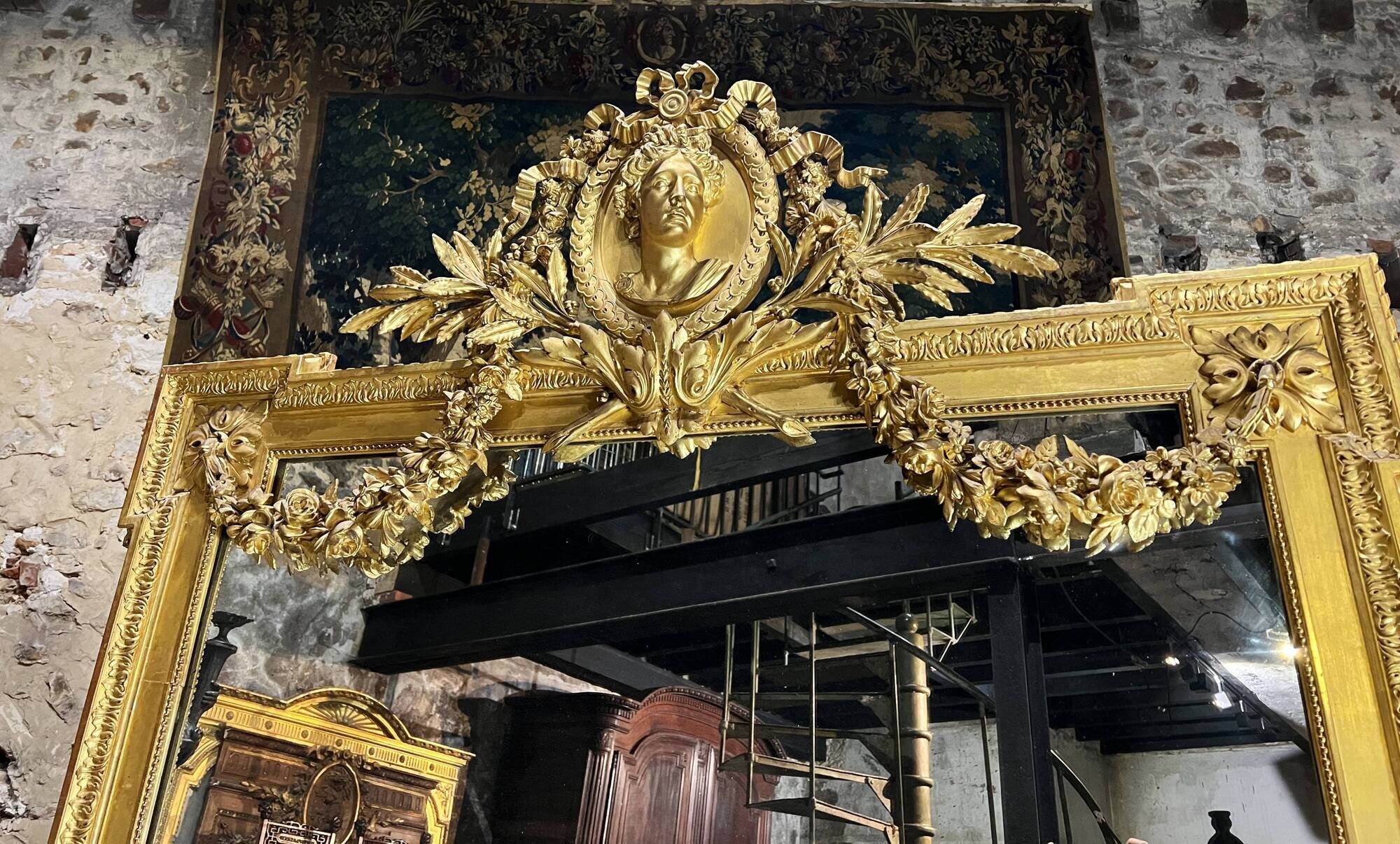 Monumental mirror Napoleon III in gilded wood with the profile of Apollo