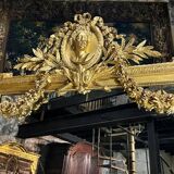 Monumental mirror Napoleon III in gilded wood with the profile of Apollo
