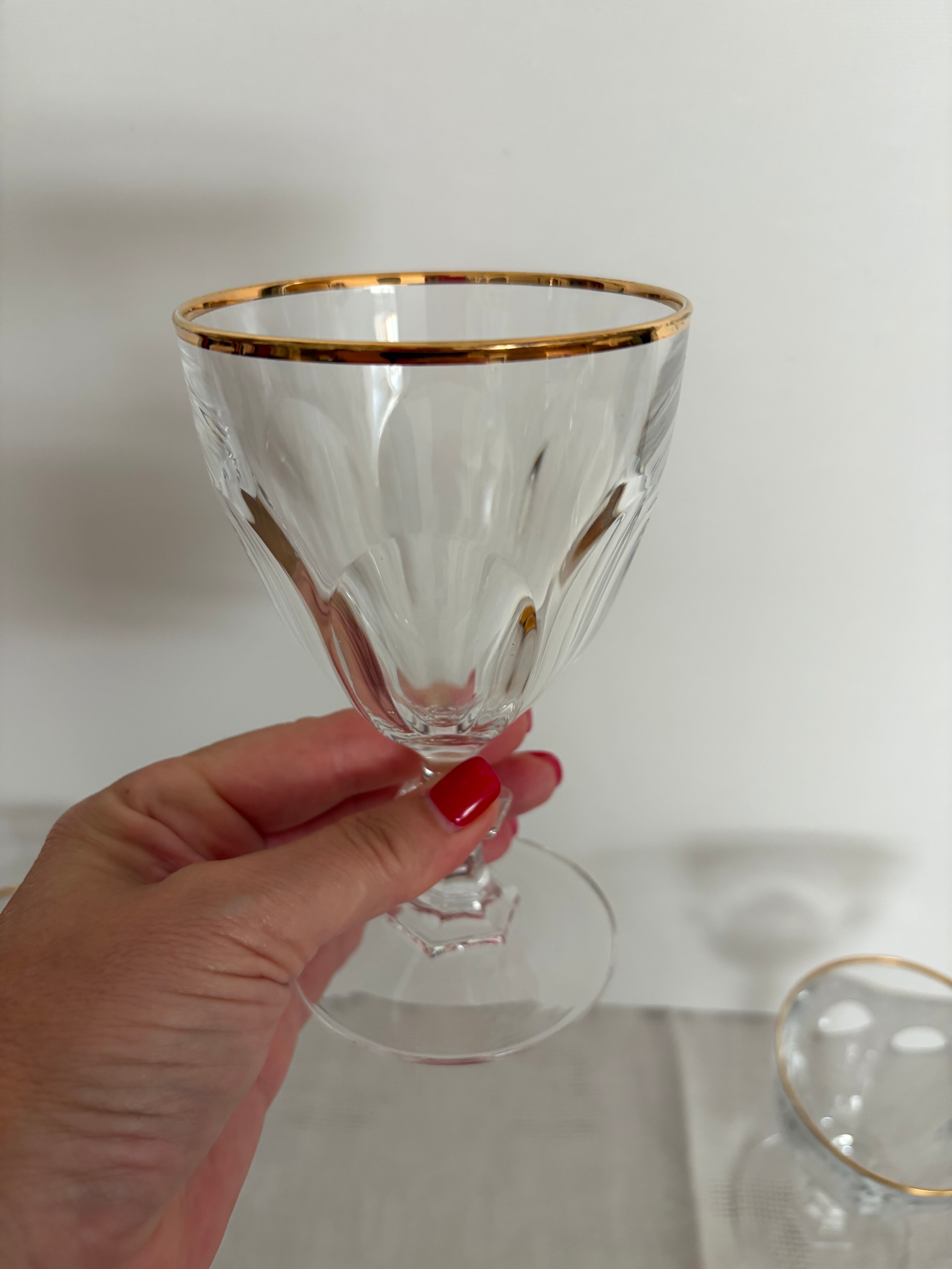 6 crystal stem glasses with a gold rim