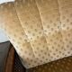Vintage wooden armchair with rattan weaving.