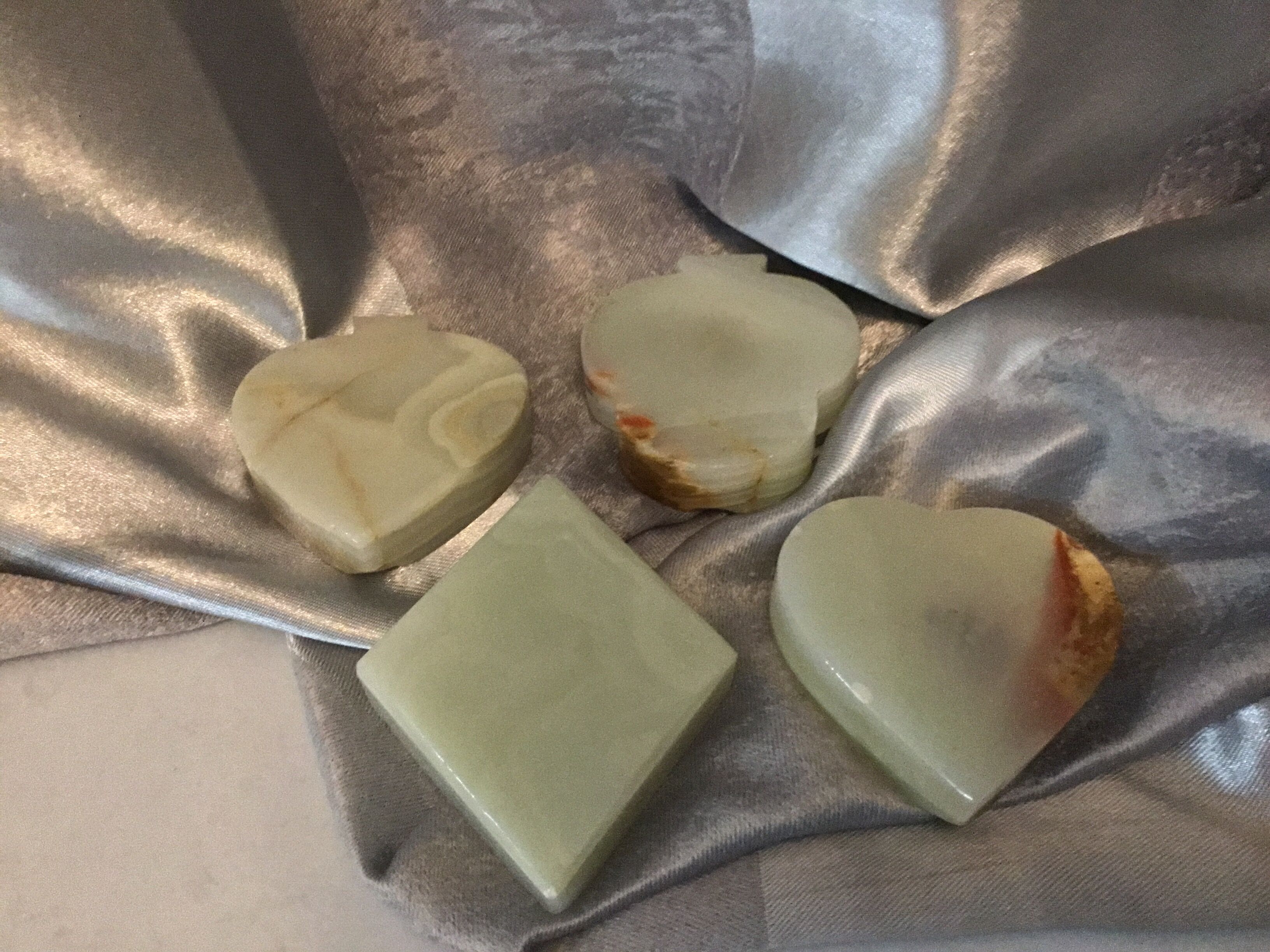 4 ashtrays in vintage alabaster