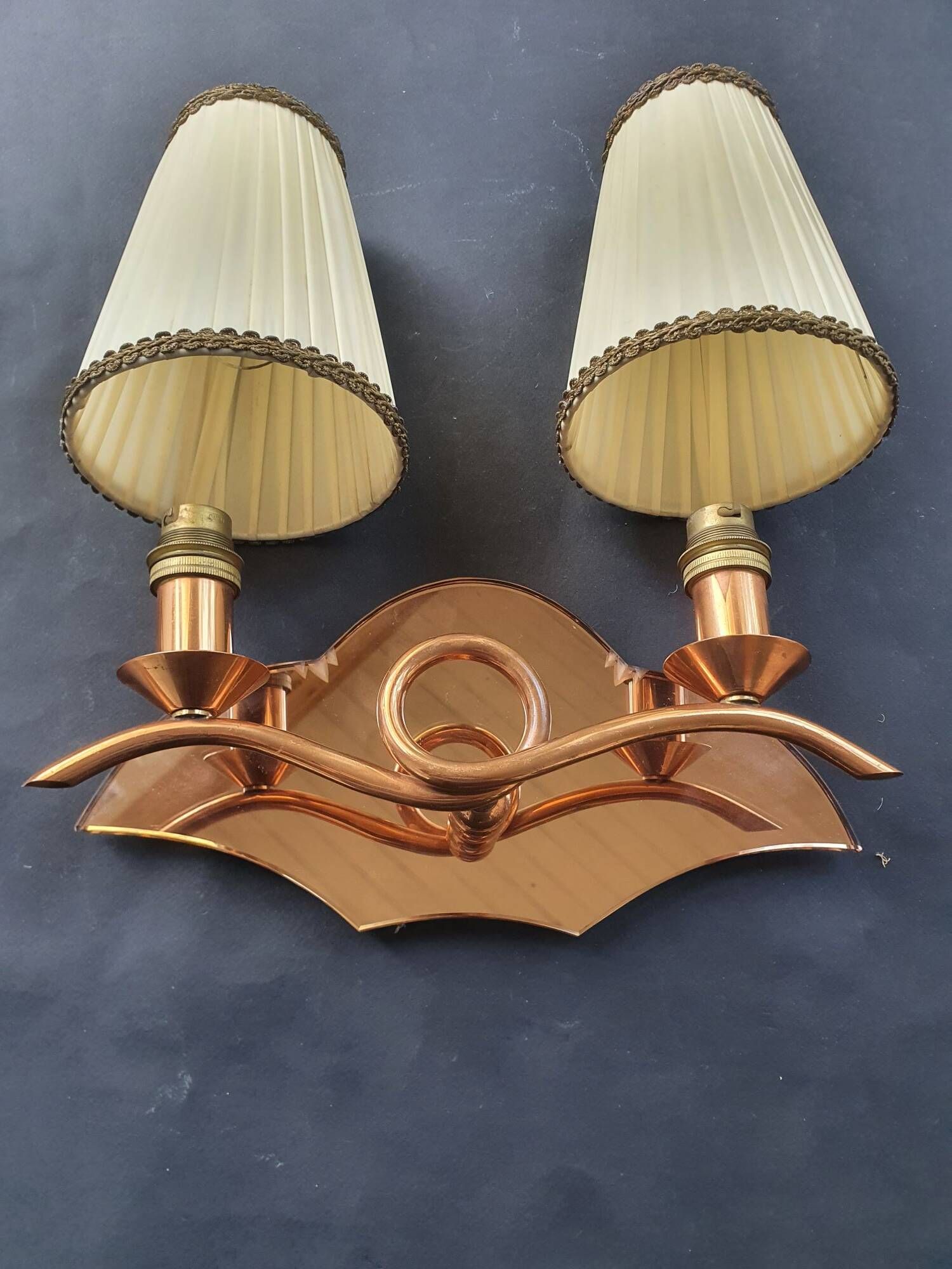 Copper wall lamp with 1940s Art Deco shades.