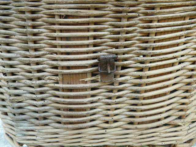 Old fishing basket rattan wood and leather