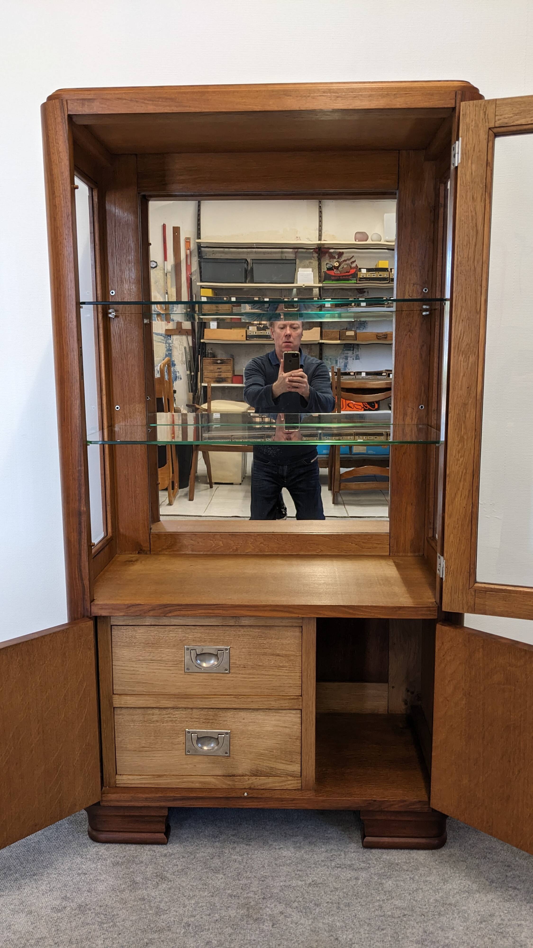 Art Deco walnut burl display cabinet, France circa 1930.