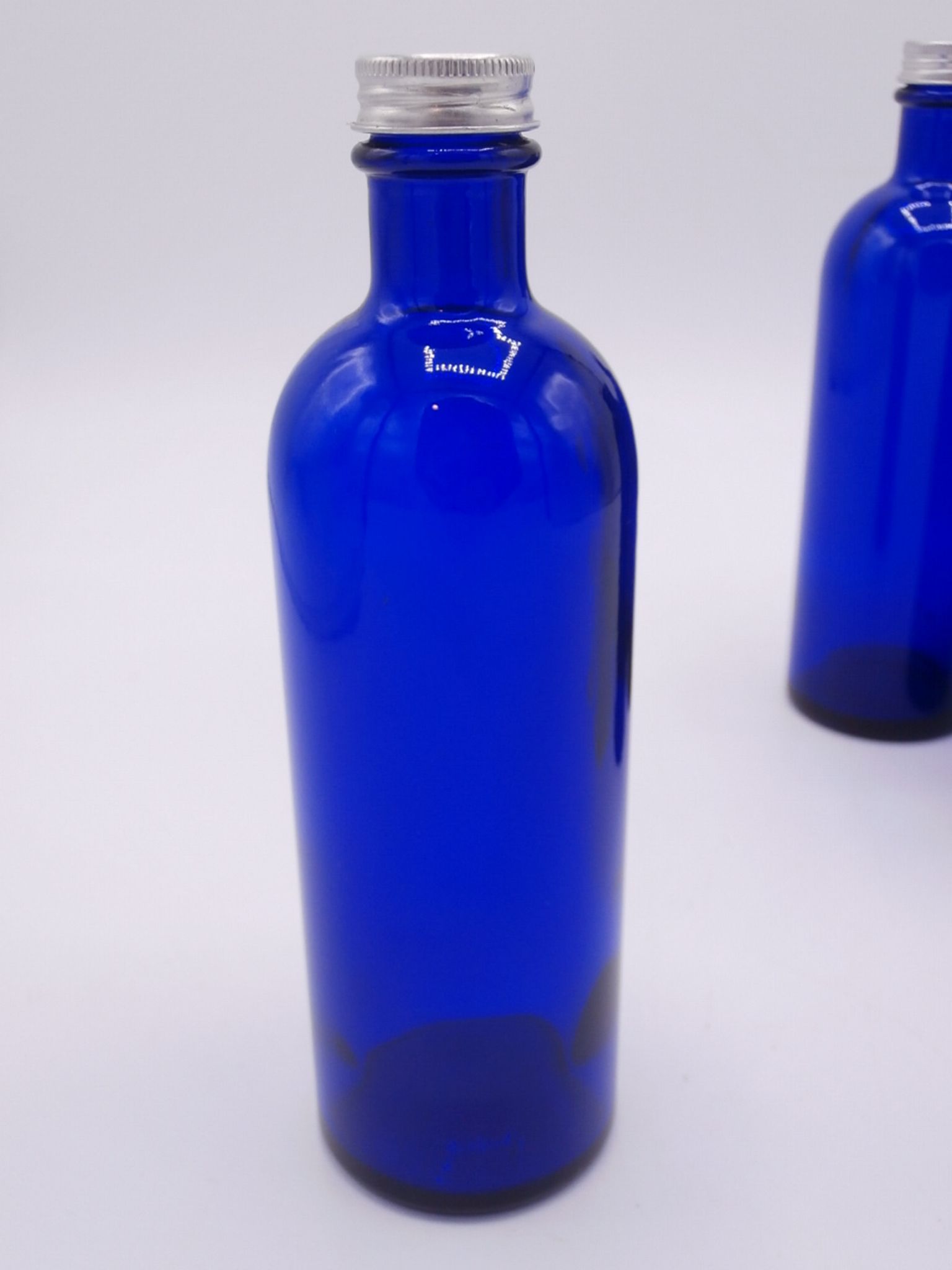 Ensemble de 4 petites bouteilles