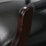 Adjustable black timeless Chesterfield office chair made of cow leather
