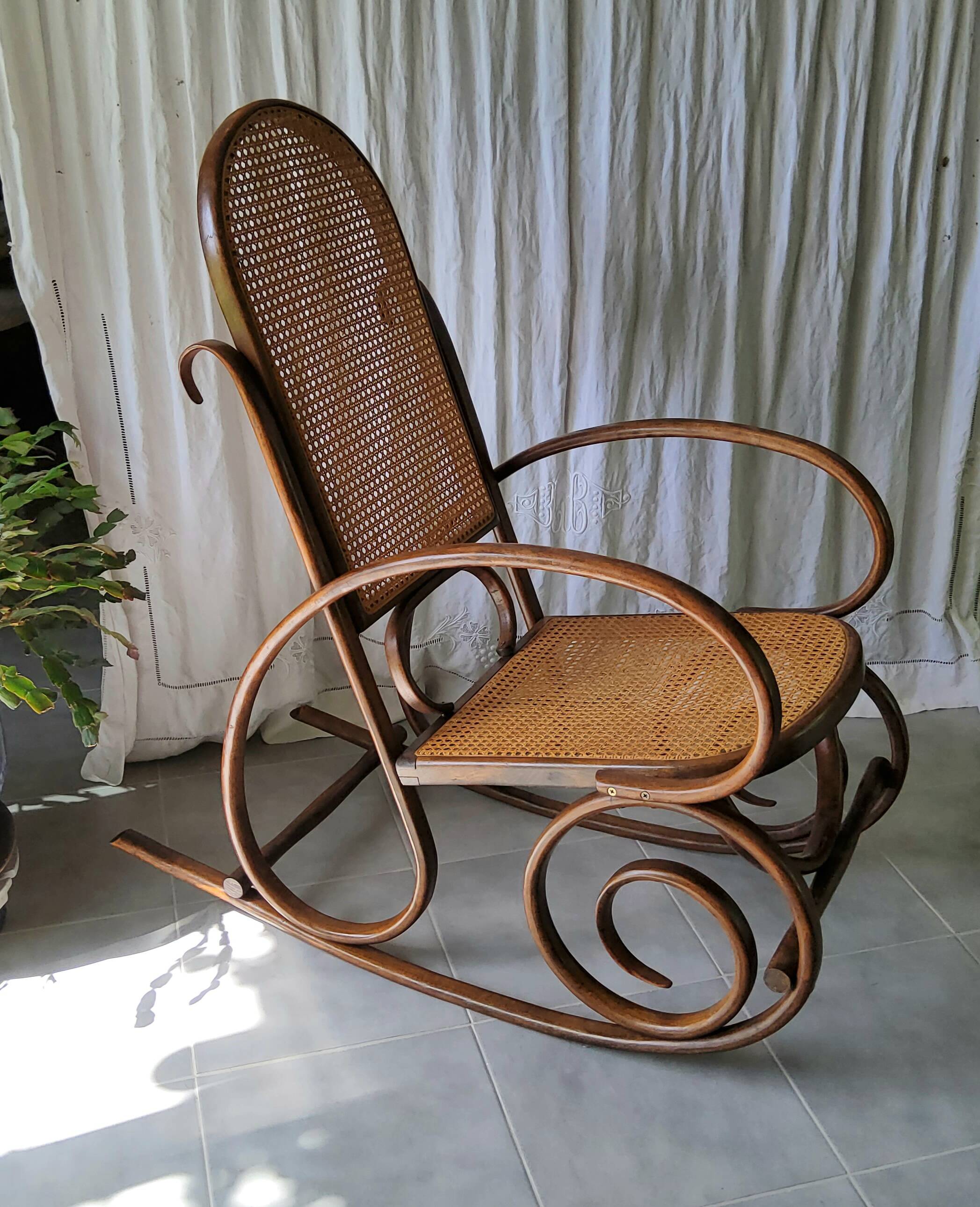Antique caned rocking chair