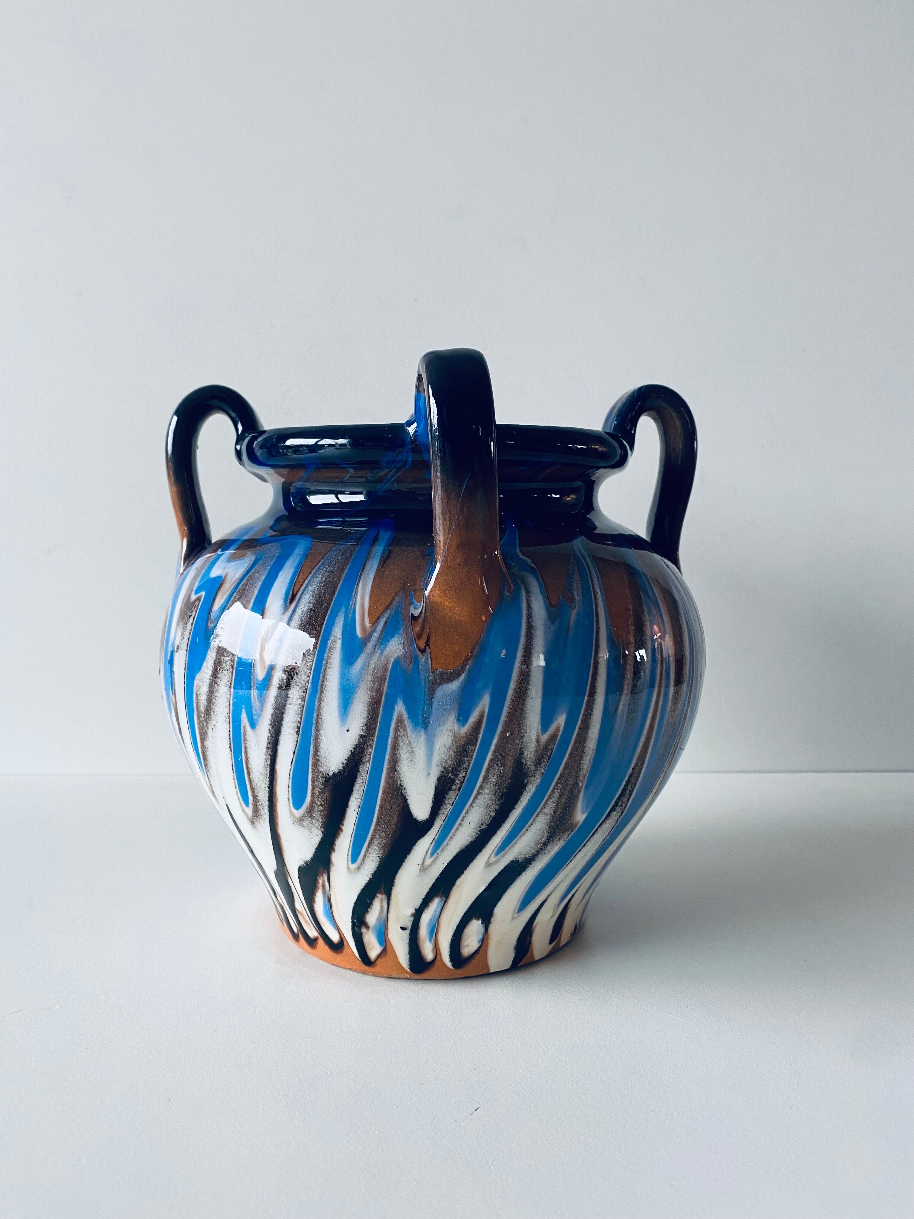 Vase old colors mixed with handles