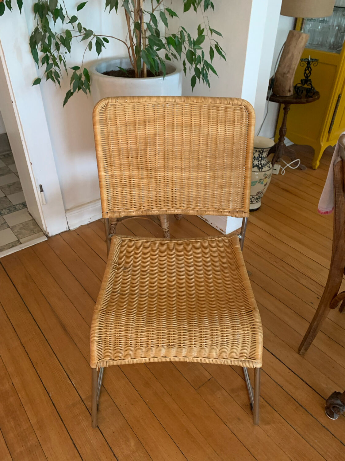 Vintage wicker and chrome chair from the 1970s.