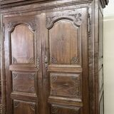 Louis XV carved wooden wardrobe from the 18th century