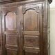 Louis XV carved wooden wardrobe from the 18th century
