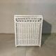 White rattan bedroom set: chest of drawers, mirror, bed, basket