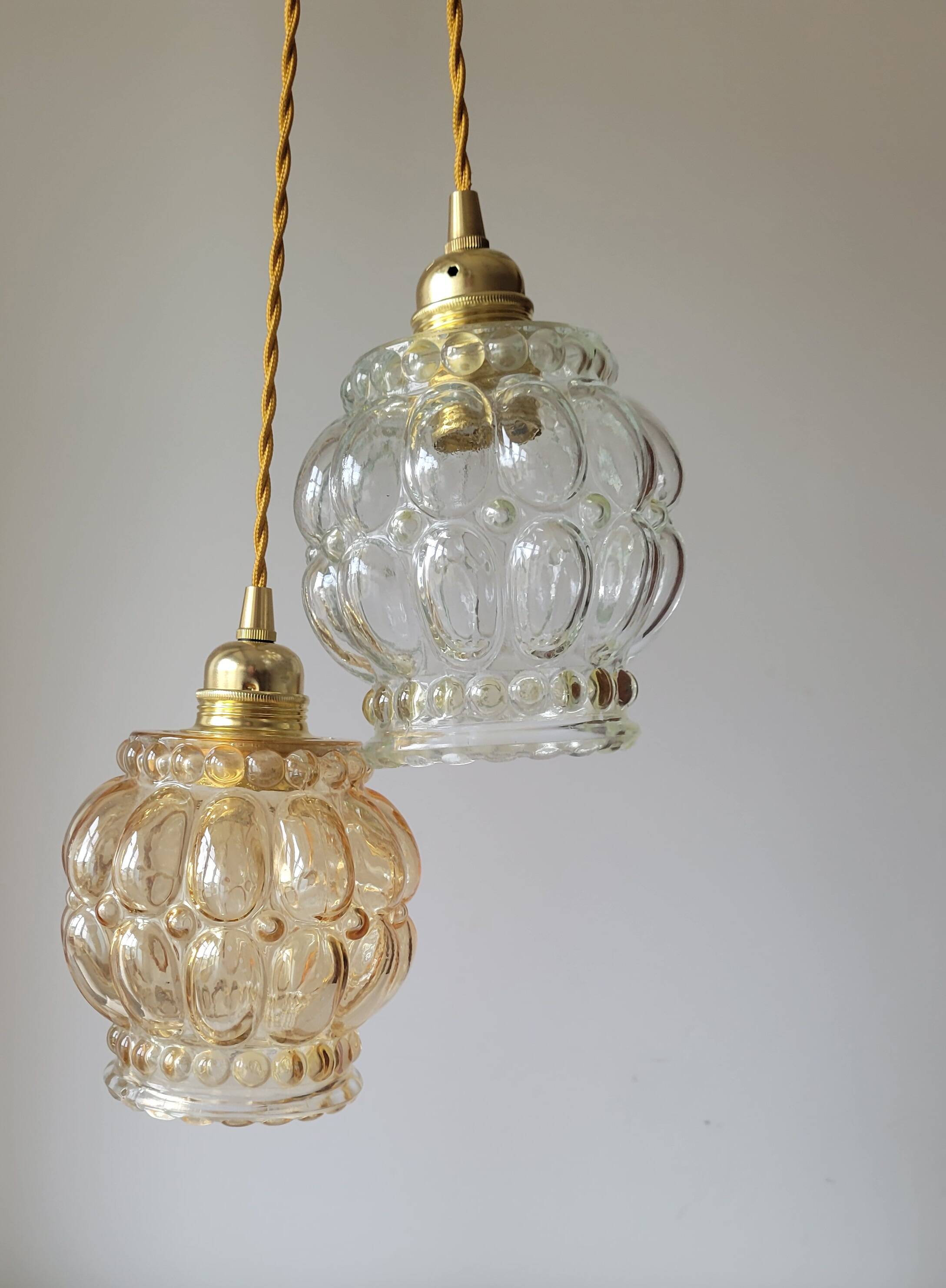 Duo of molded glass pendant lights