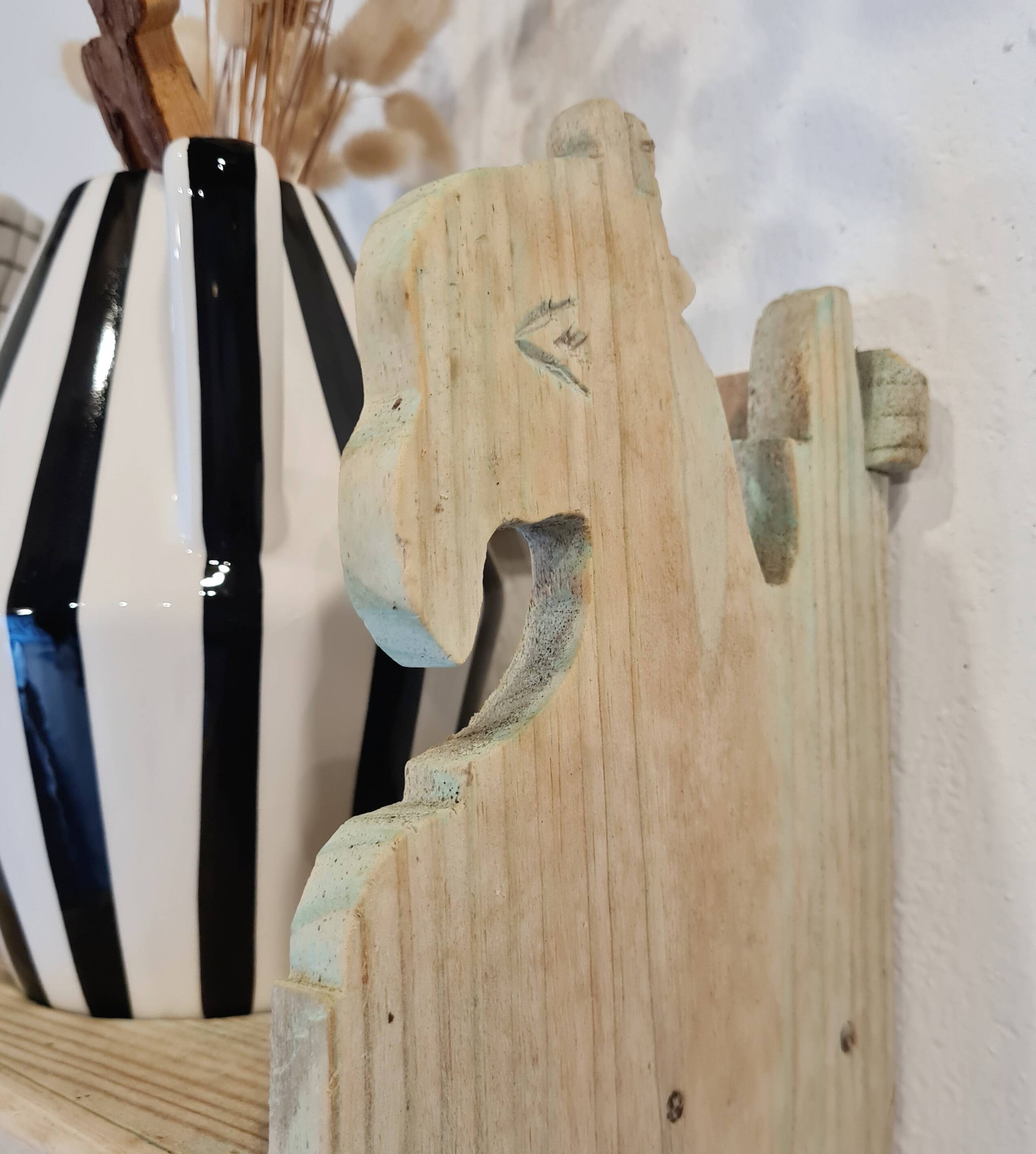 Antique wall shelf in raw wood