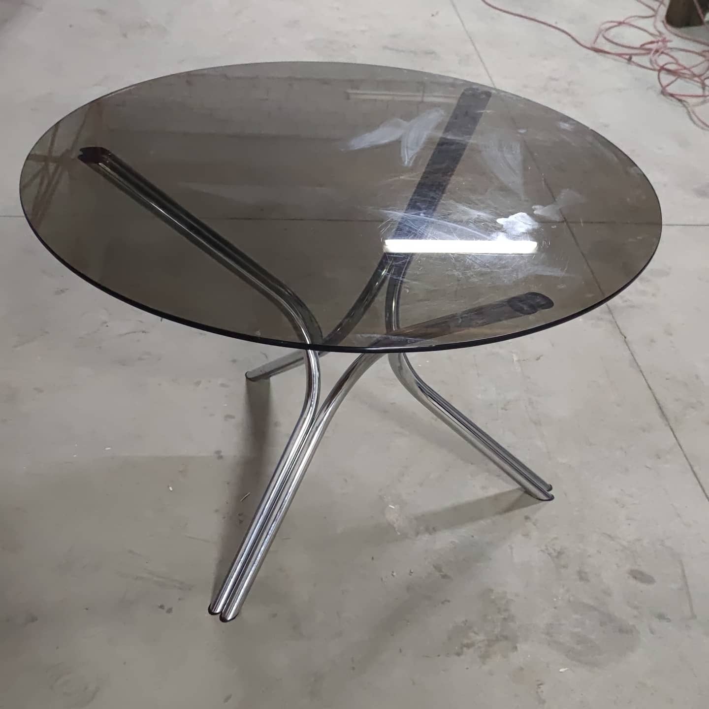 Tripod table in chrome steel and tray in smoked glass circa 1970