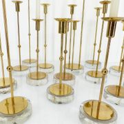Set of 15 Scandinavian candle holders in brass and glass, Gunnar Ander, Ystad Met
