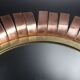 Round mirror in cut copper, sun-shaped  1970