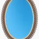 Engraved mirror surrounded by metal