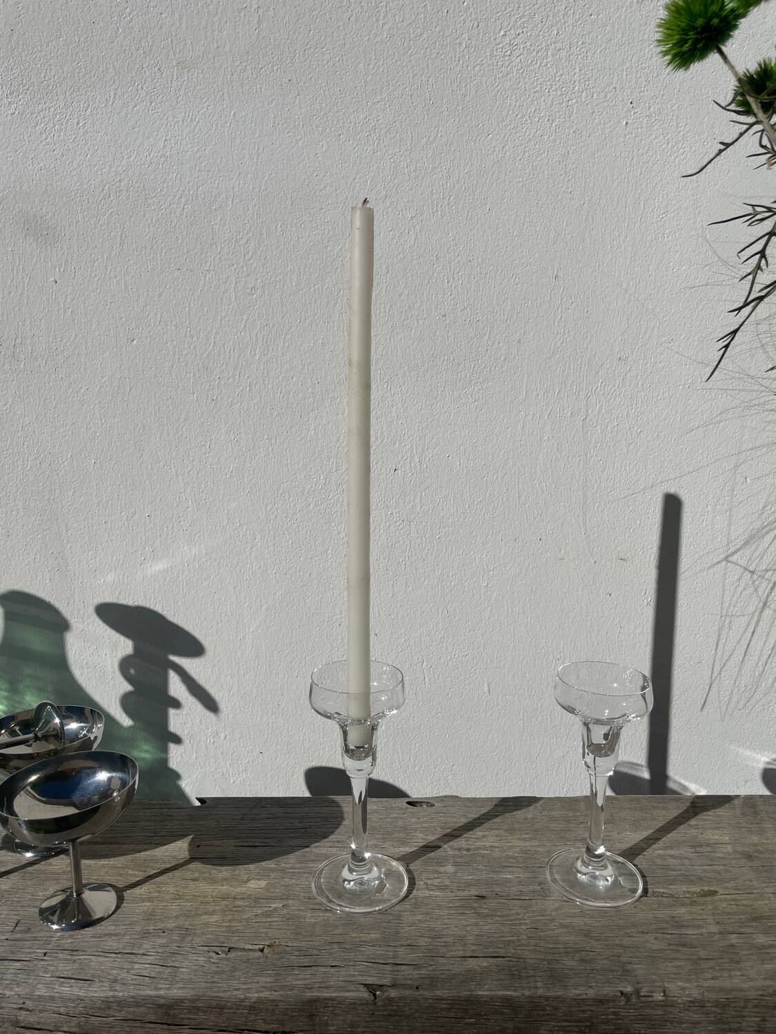 Pair of clear glass candlesticks, signed