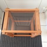 Light solid wood side table. 2 dyed glass shelves.