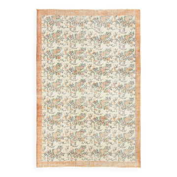 Tapis en laine et coton à décor floral