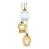 Cascade pendant light with 3 molded glass globes in vintage arabesque amber glass