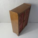 Rattan doll cabinet