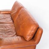 Vintage three-seater leather sofa. Edition by Roche Bobois. France, 70s-80s