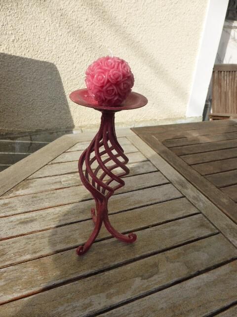 Twisted, patinated wrought iron candlestick red vintage, with pink rose candles