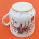 Old coffee cup / saucer in porcelain