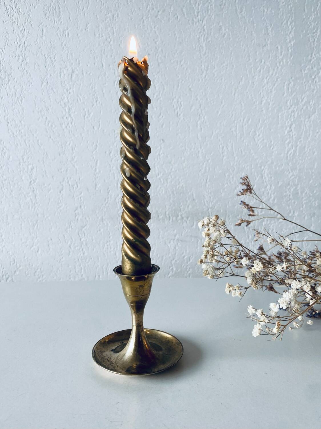 Golden brass candle holder