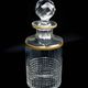 Flacon Baccarat modèle Nancy, cristal taillé et liseré doré, avant 1936
