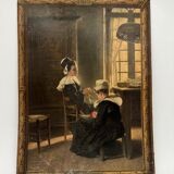 Sign read on cardboard illustrated with two Breton women in costume