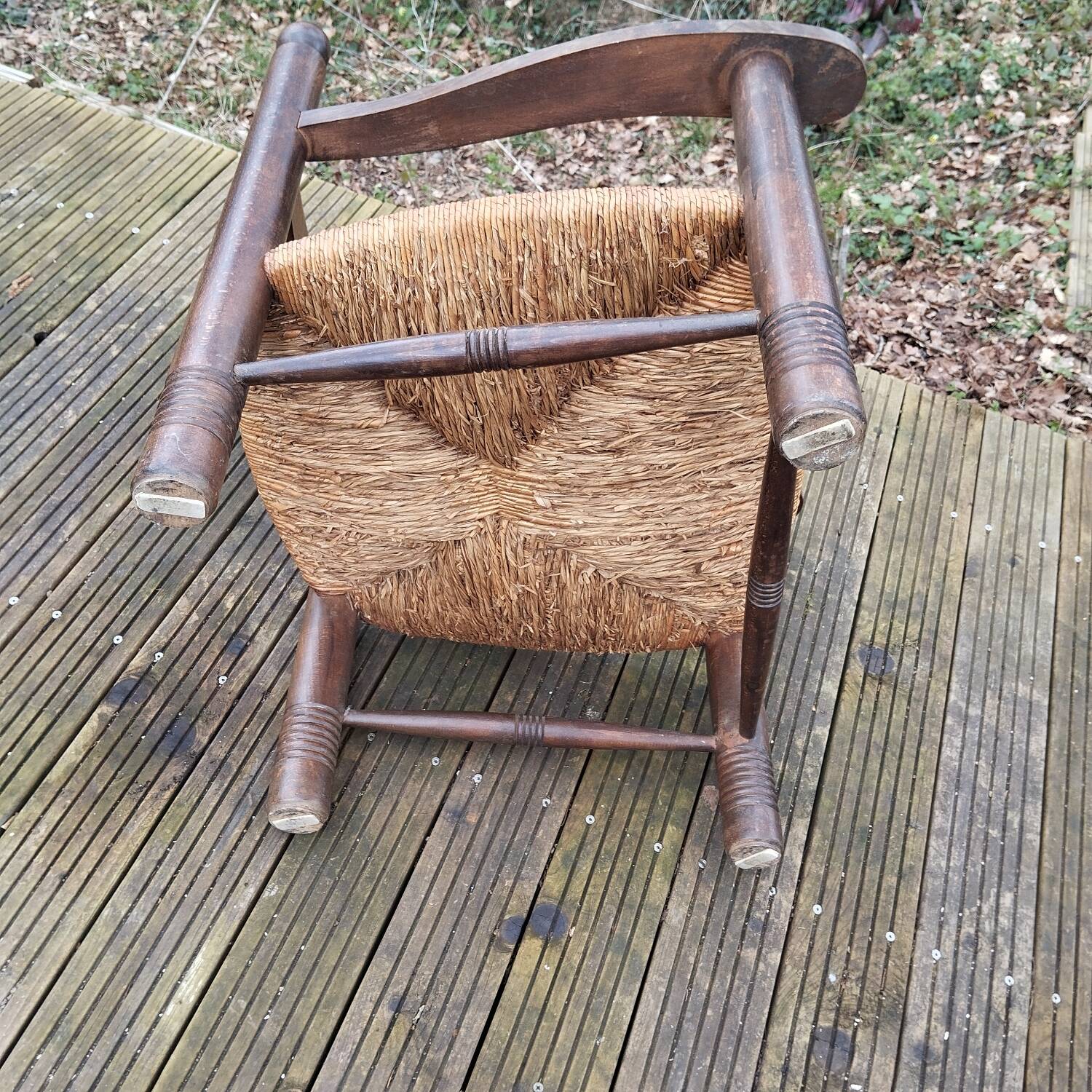 Low straw fireplace armchair in Dudouyt style
