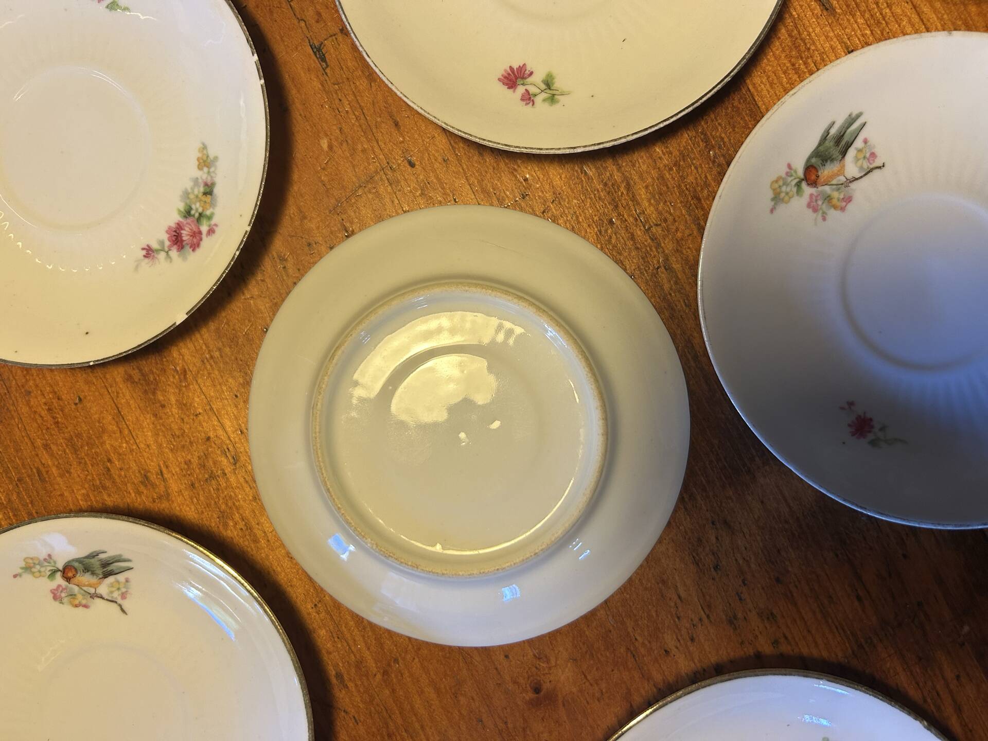 Set of 6 antique porcelain saucers