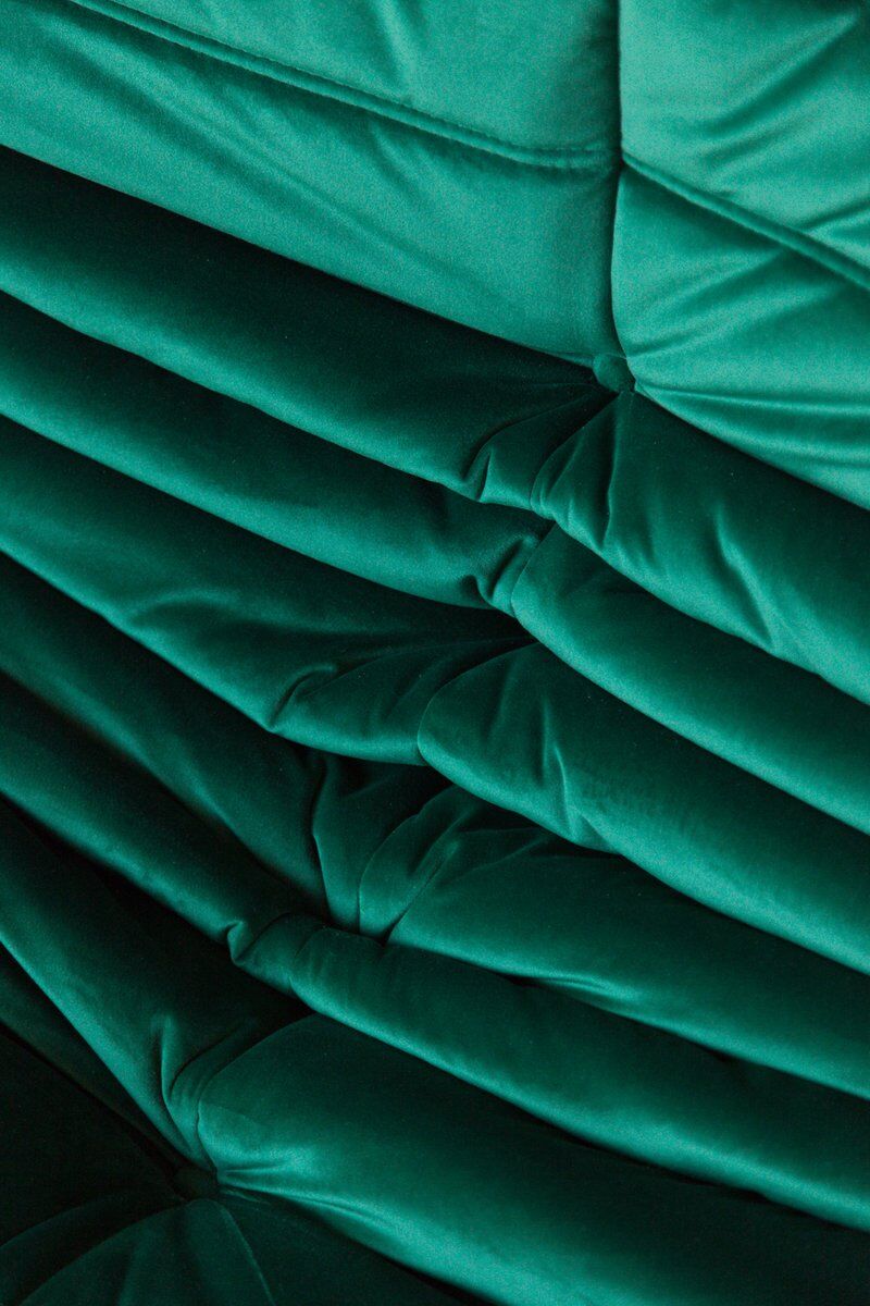 Togo lounge chair in bottle green velvet by Michel Ducaroy for Ligne Roset