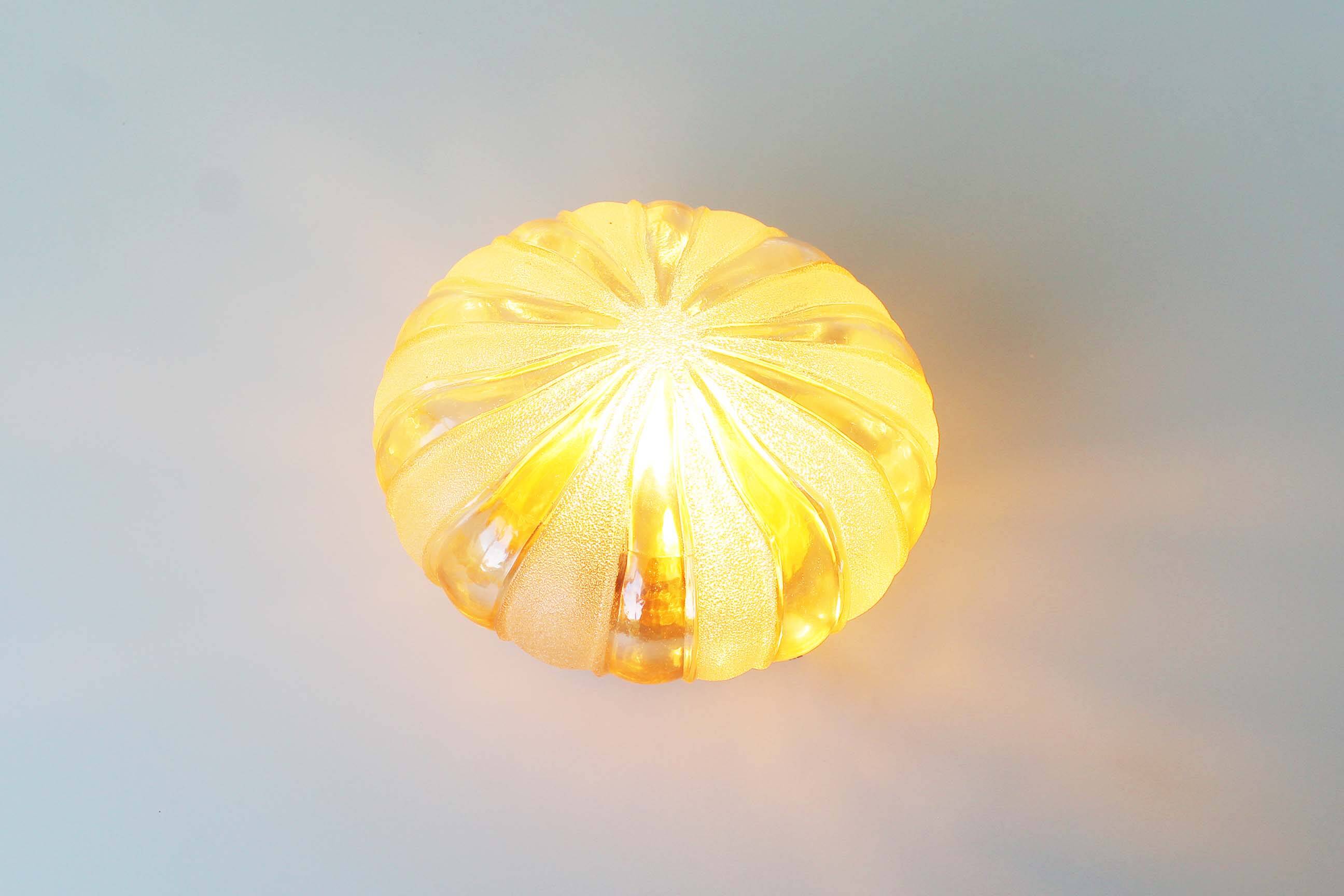 Vintage amber glass wall lamp by Wila Leuchten, Germany 1970's