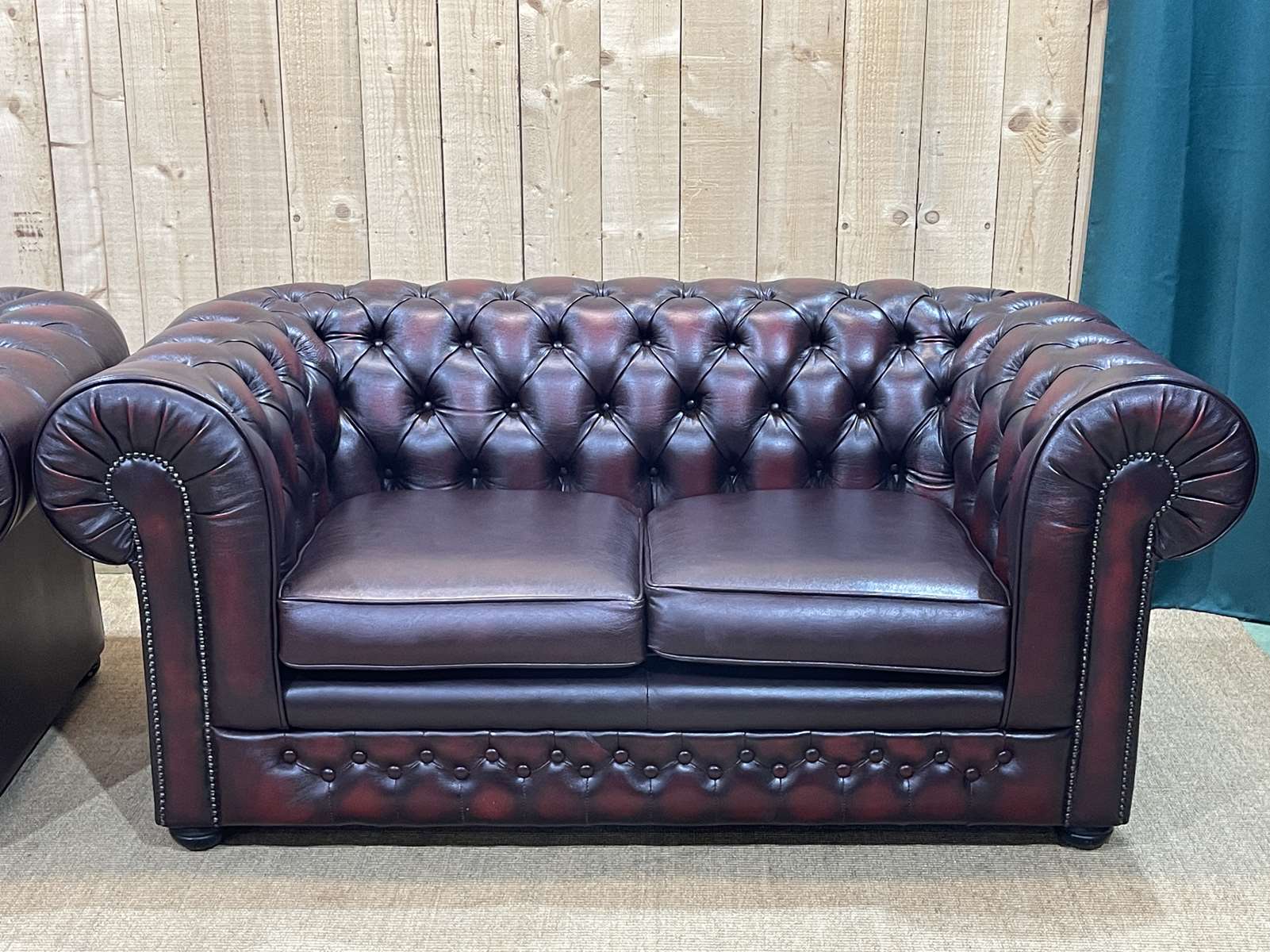 Pair of 2-seater leather Chesterfield sofas from the 1990s by Thomas LLOYD
